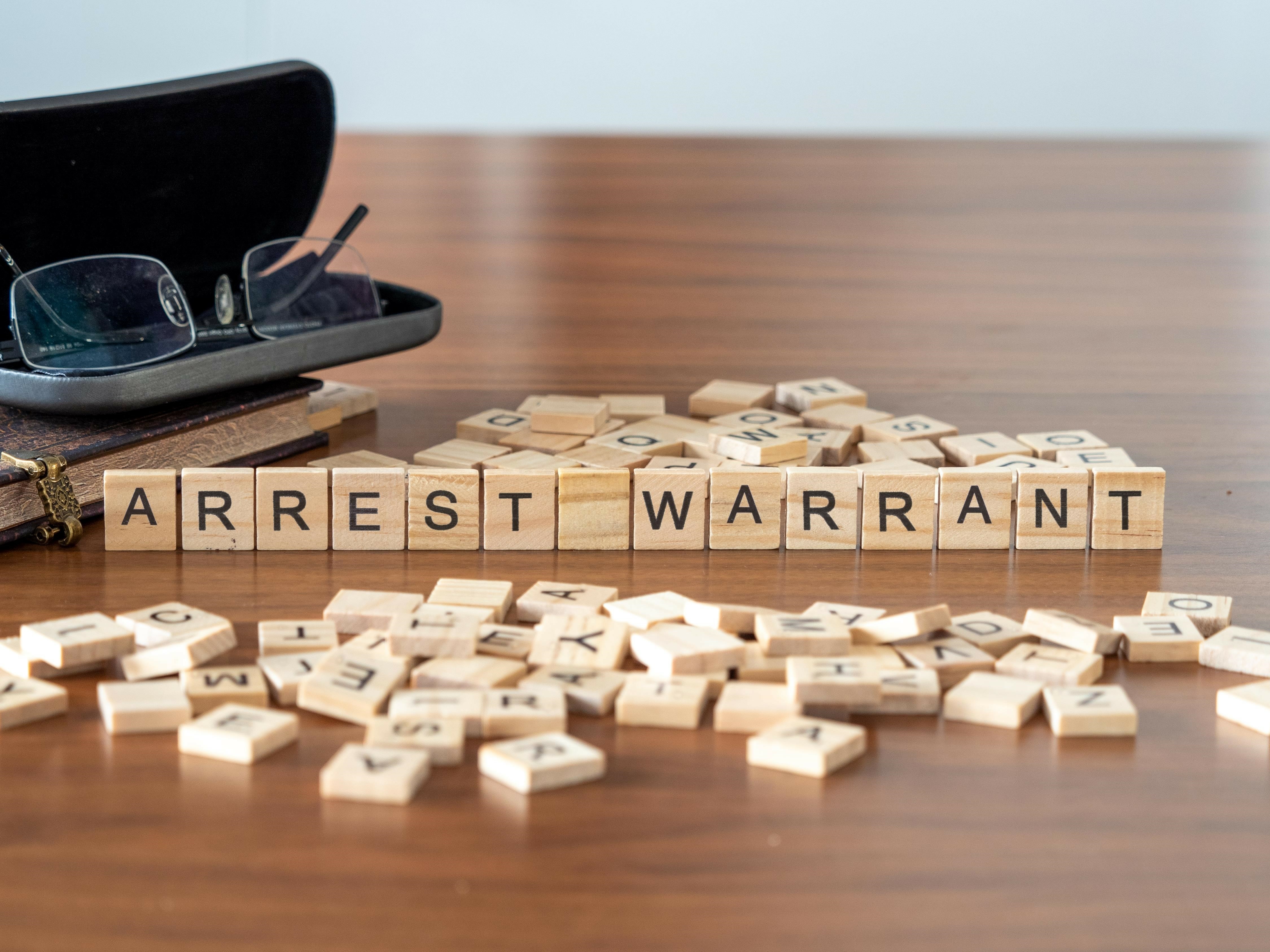 RESOLVE AN ARREST WARRANT